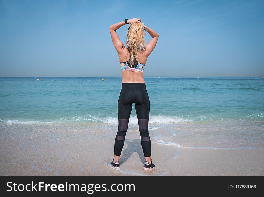 Woman Near Body Of Water