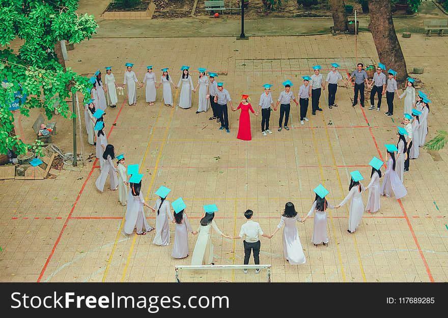 Photography Of Group Of People Form Heart-shape