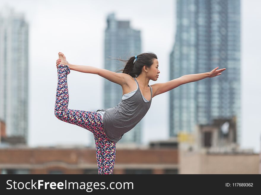 Selective Focus Photography of Woman Doing Yoga
