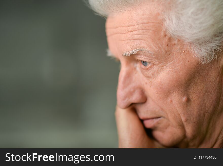 Portrait of sad senior man