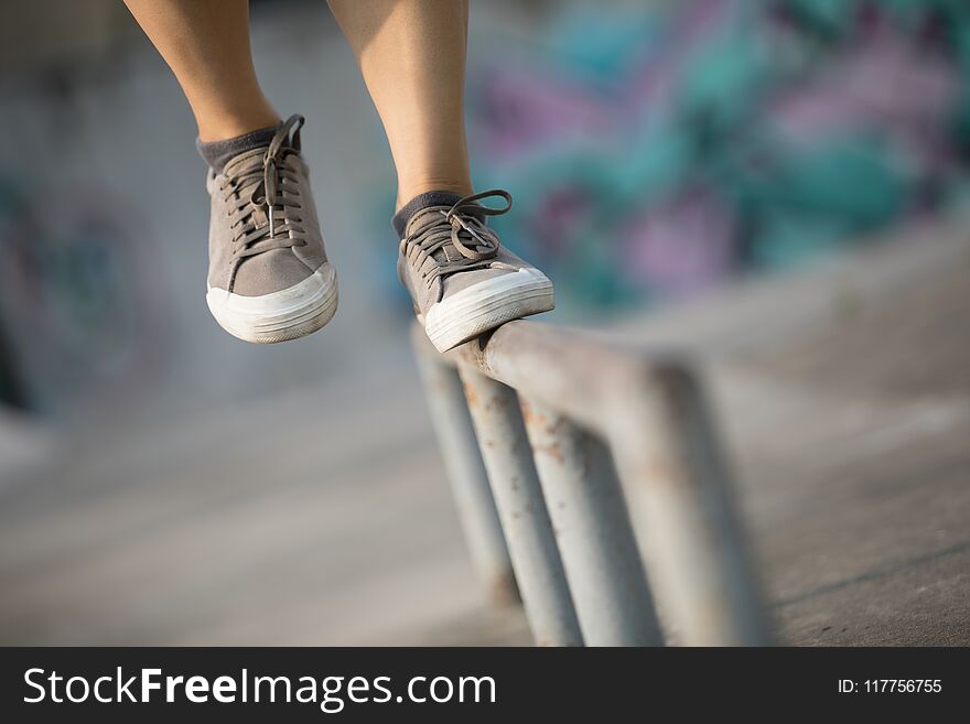 Legs walking on steel pipe