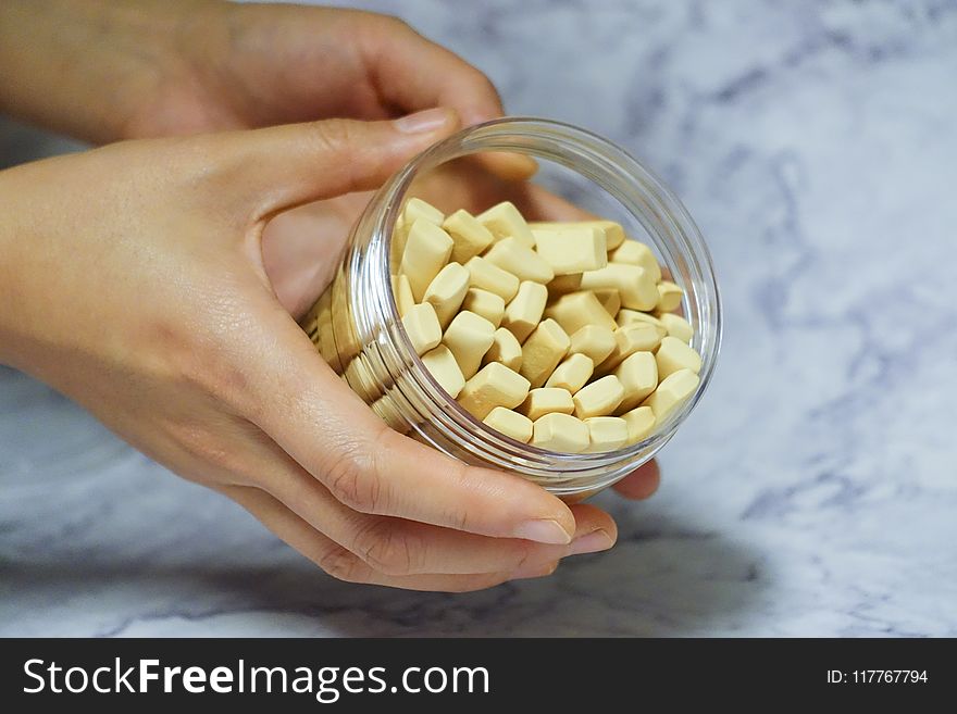 Person Holding Jar