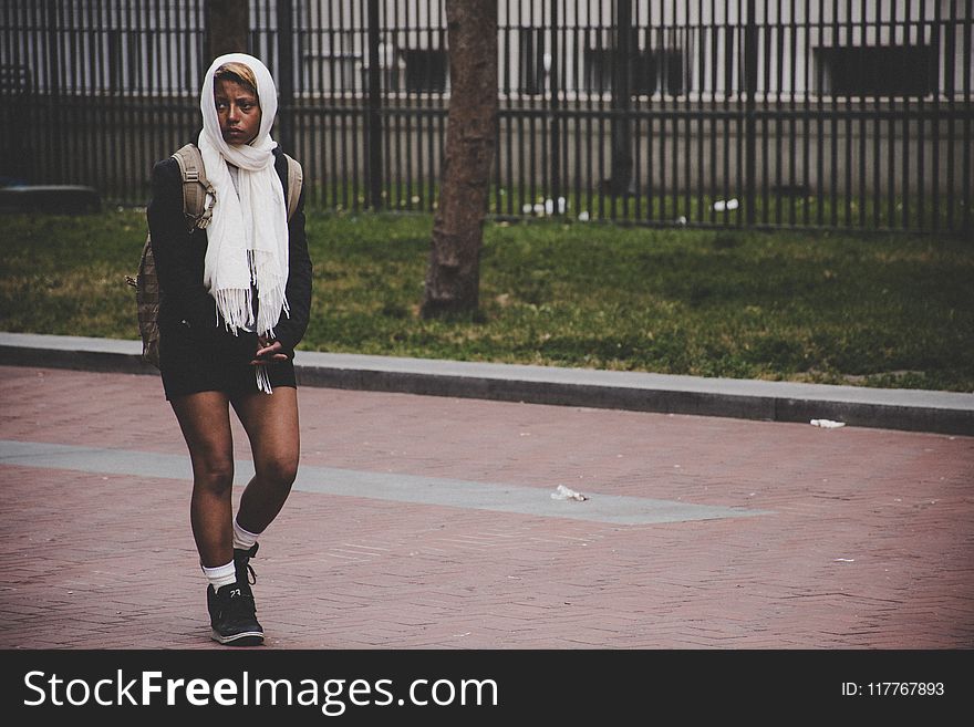 Woman Wearing White Scarf