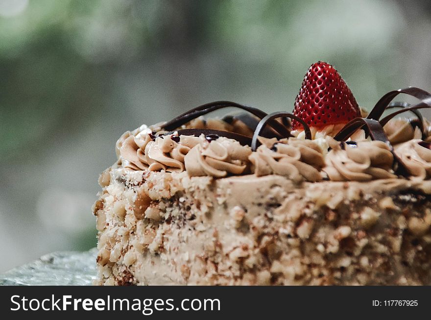 Shallow Focus Photography Cake With Red Strawberry on Top