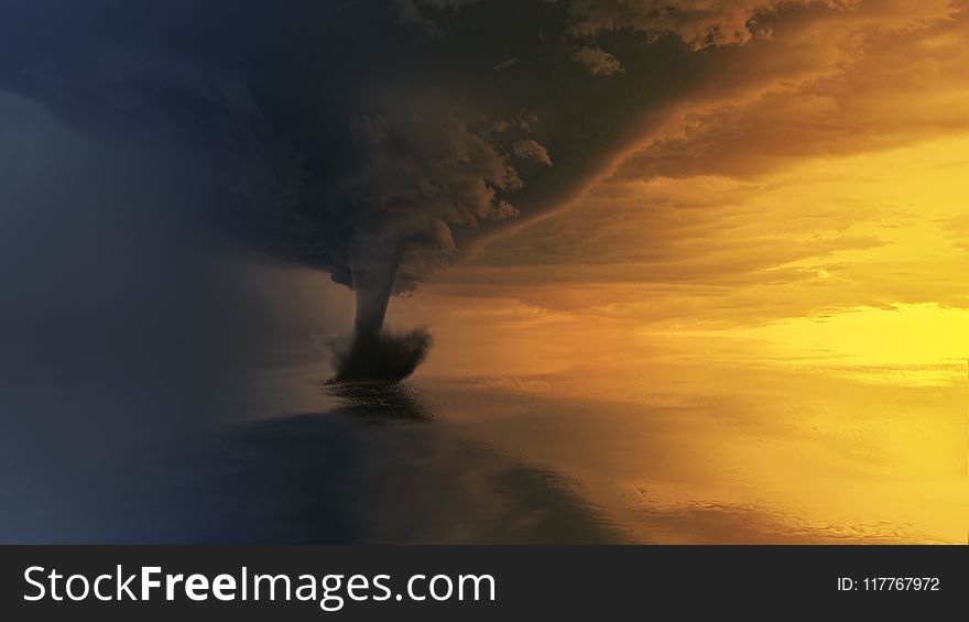 Tornado on Body of Water during Golden Hour