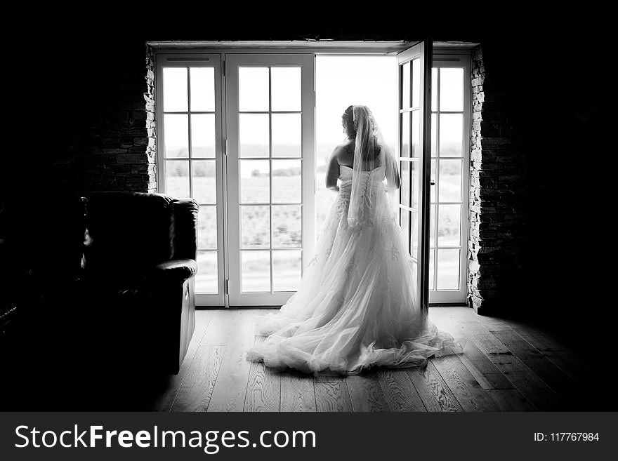 Grayscaled Photography of Woman Wearing Wedding Dress