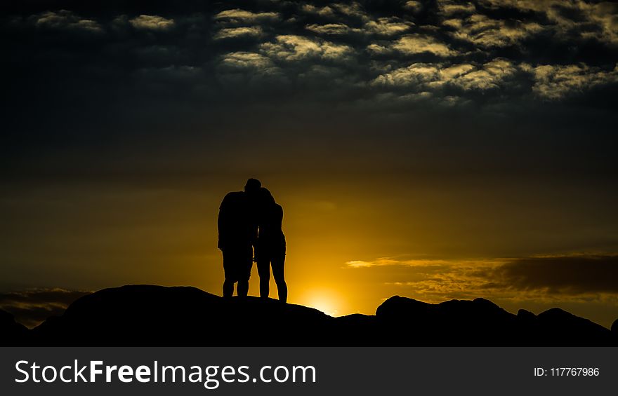 Silhouette Photo of Man and Woman