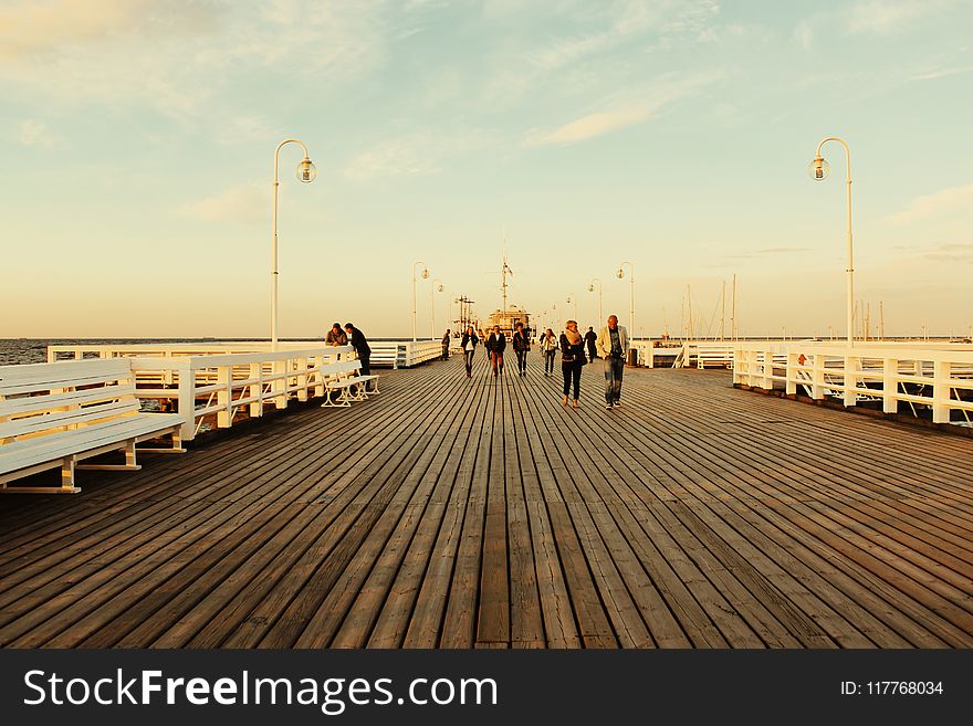 People Walking on Board Walk