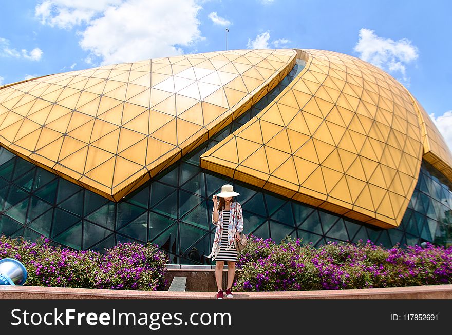 Woman Standing Near Dome Building