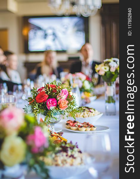 Selective Focus Photography Of Flower On Table