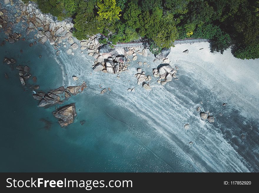 Aerial Photography Of Stones On Seashore