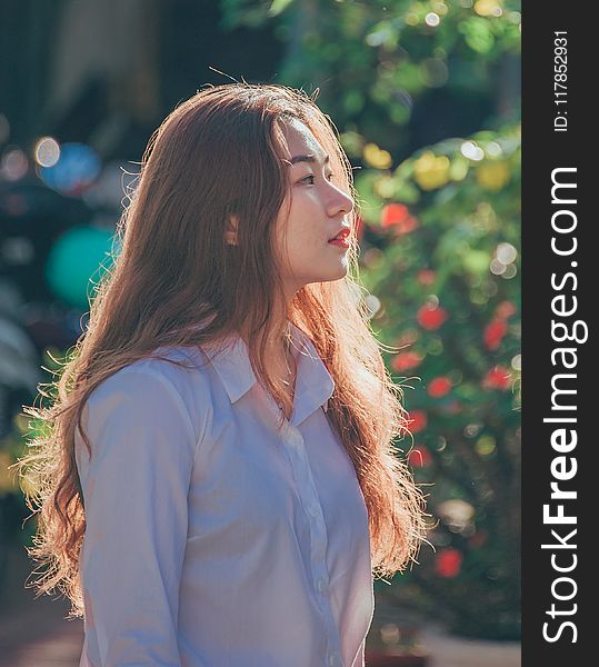 Woman In White Collared Button-up Long-sleeved Shirt