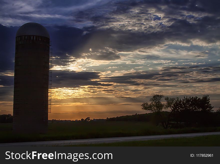 Silhouette of Silo during Sundown