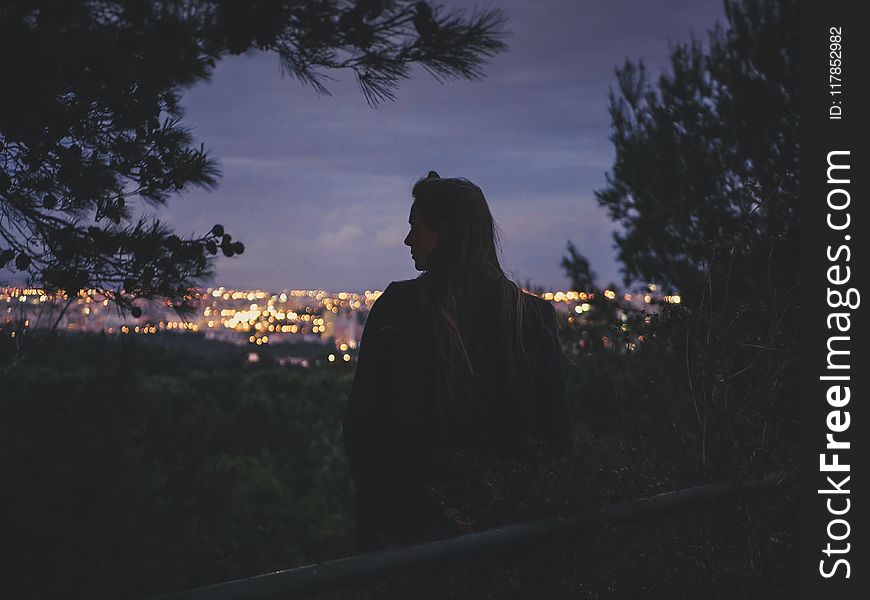 Woman Standing Near Tree