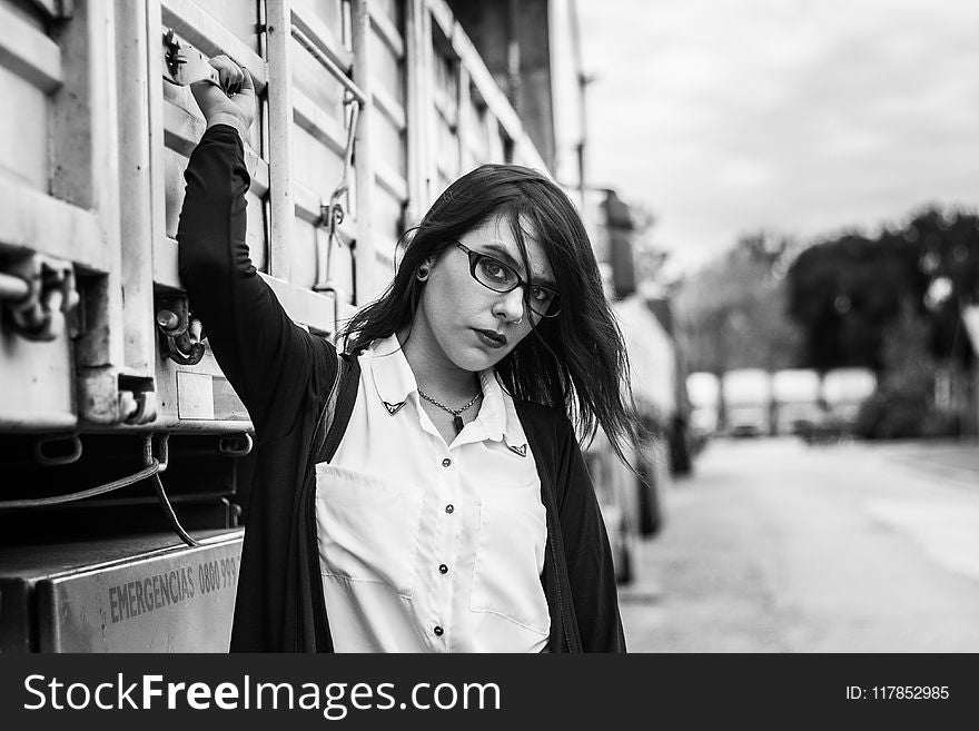 Woman With Zip-up Jacket Stand Beside Truck