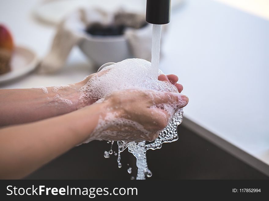 Person Washing His Hand