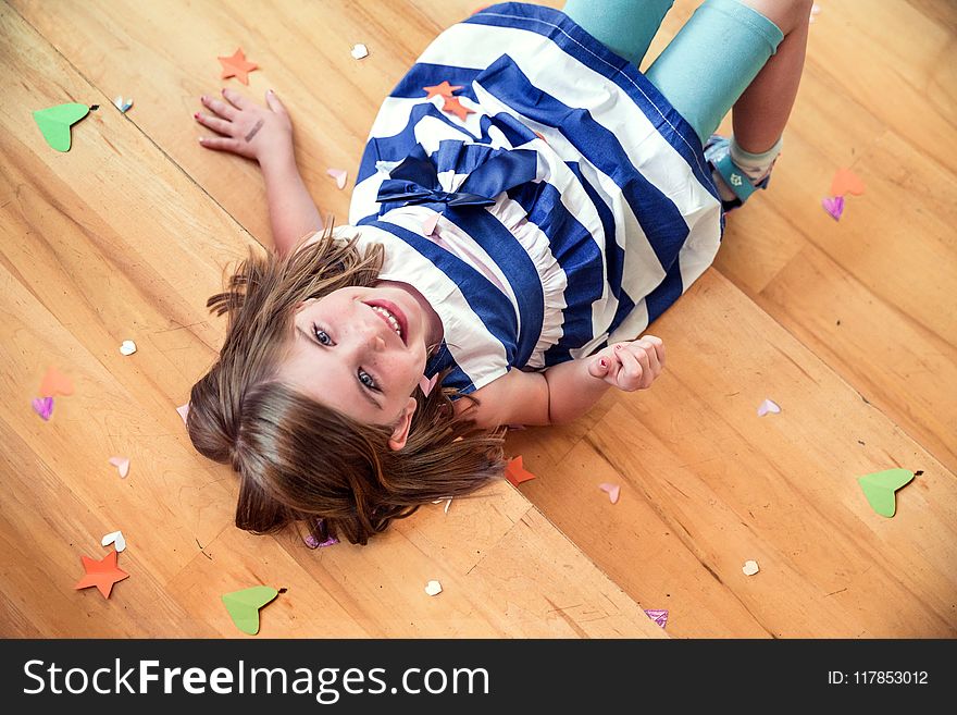 Girl Wearing White And Black Stripe Dress