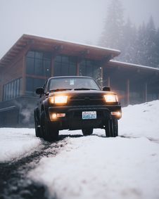 Black Toyota Vehicle On Snow Field