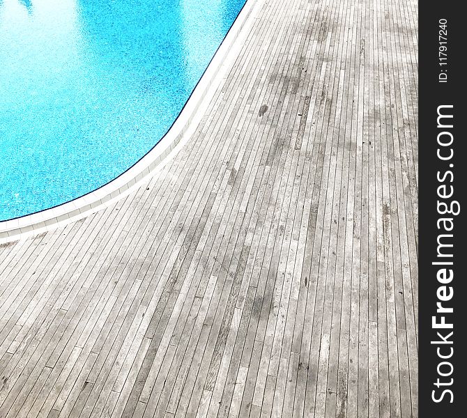 Wooden Floor Beside Pool