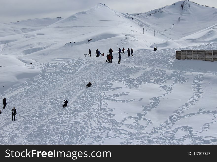 Person Walking On Snowfield