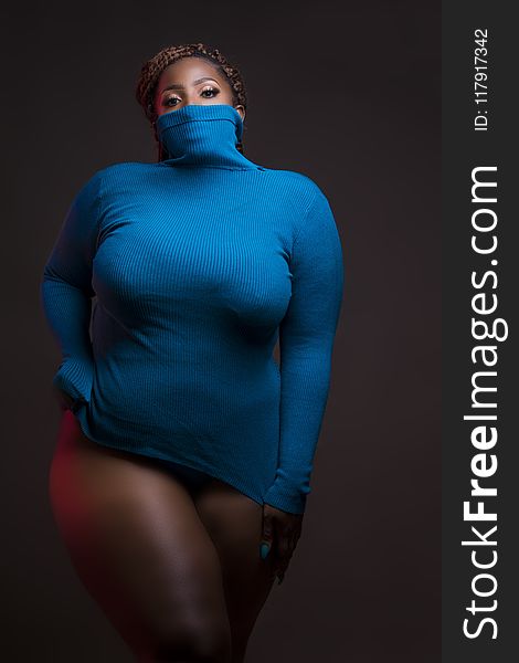 Woman In Blue Turtleneck Sweatshirt