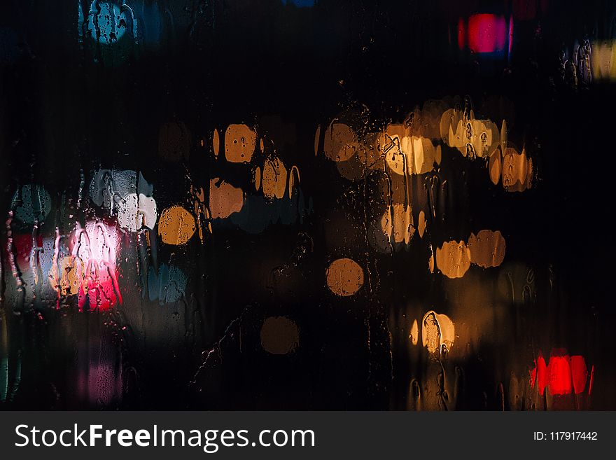 Selective Focus Photography of Wet Glass