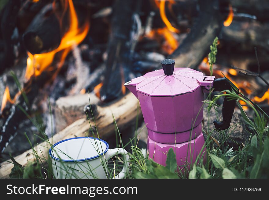 Mug and a geyser coffee maker.