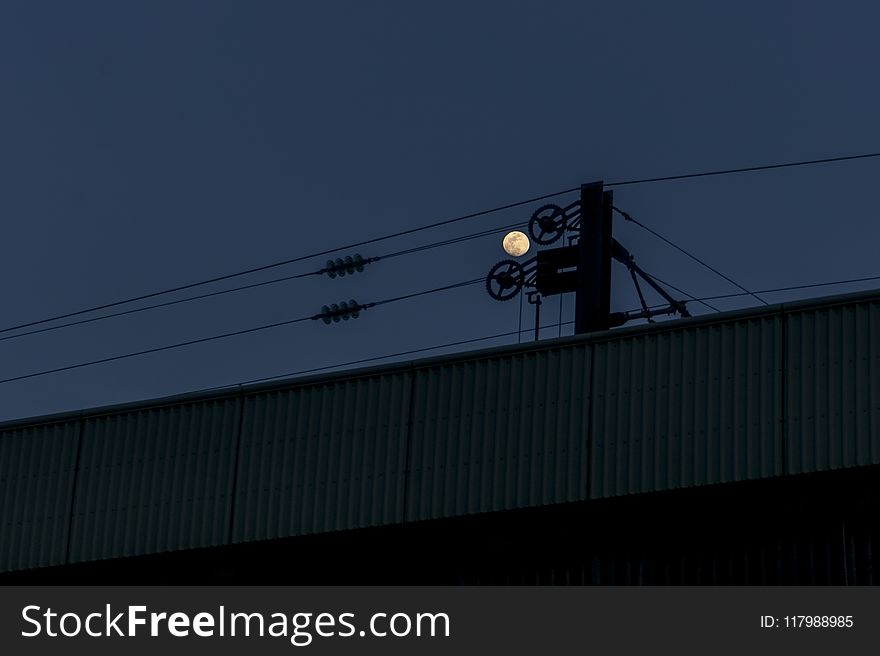 Silhouette Of Electric Wires During Nighttime