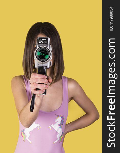 Girl Wearing Purple Tank Top Holding Canon Camera