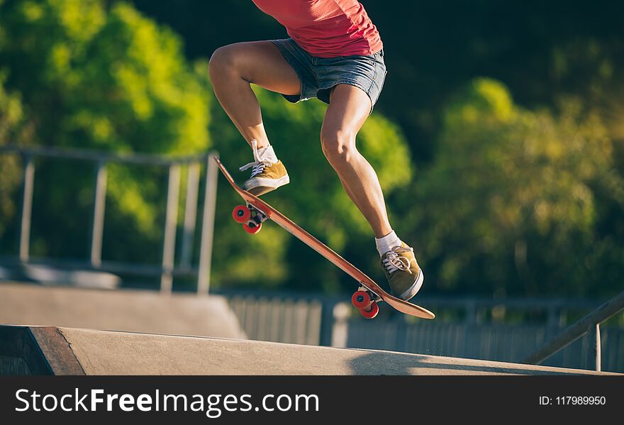 Skateboarder Skateboarding On Skatepark