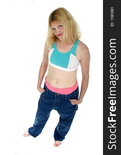 Beautiful Freshly Skinny Blonde Middle Aged Woman Excited about losing weight and inches as shown by her former pair of pants in which she immitates her teenage son. Beautiful Freshly Skinny Blonde Middle Aged Woman Excited about losing weight and inches as shown by her former pair of pants in which she immitates her teenage son.