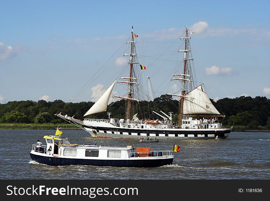 Two-masted ship parading on the river Scheldt in Antwerp, during the 50th Tall Ships Race of 2006. Two-masted ship parading on the river Scheldt in Antwerp, during the 50th Tall Ships Race of 2006