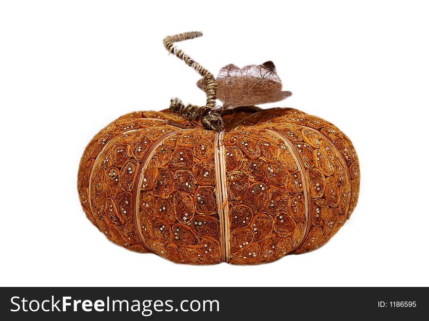 Faux fake pumpkin on white isolated background