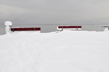 Red Benches In White Snow Stock Photos