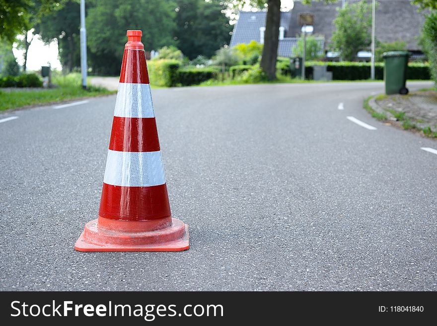 Red And White Traffic Cone On Road