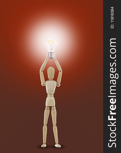 Wooden mannequin holds light bulb, Concept bright idea, solution