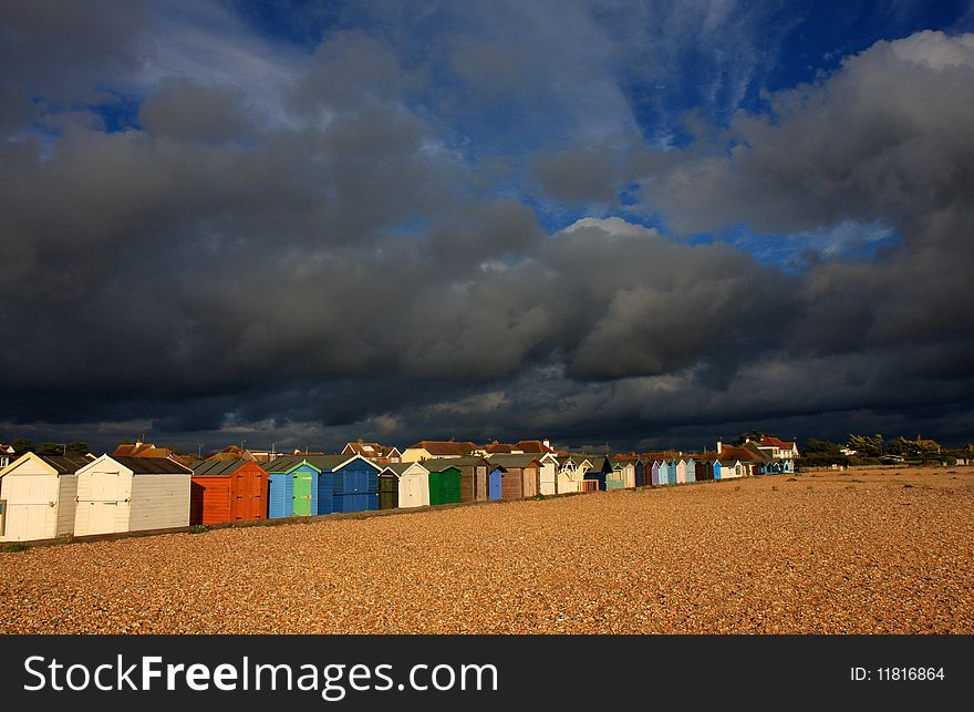 Beach Huts With Stormy Sky