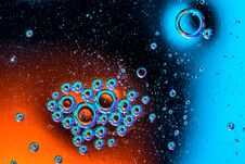 Macro Shot Of Oil Bubbles With Water On Colorful Background. Space And Universe Planets Styled Abstract Image Stock Photography Macro Shot Of Oil Bubbles With Water On Colorful Background. Space And Universe Planets Styled Abstract Image Stock Photography