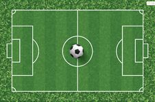 Soccer Football Ball On Green Grass Of Soccer Field Background. Stock Photo