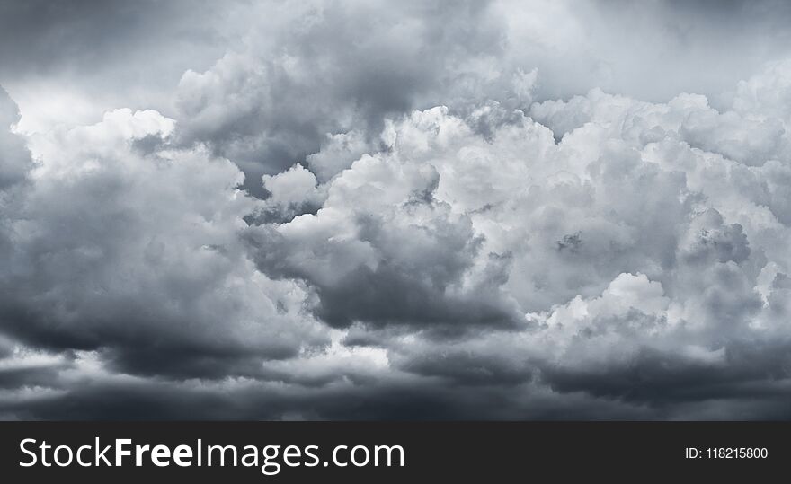 Dark storm clouds before rain for climate background.