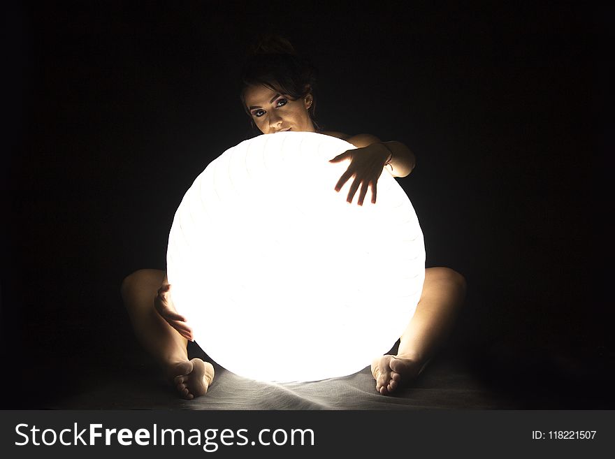 Woman Holds Led Large Ball