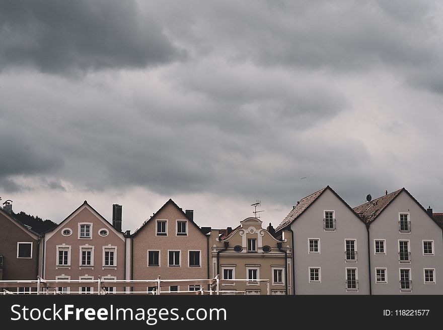 Houses Under Cloudy Sky
