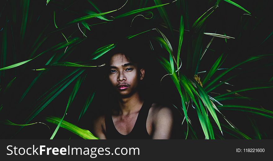 Man Wearing Black Tank Top