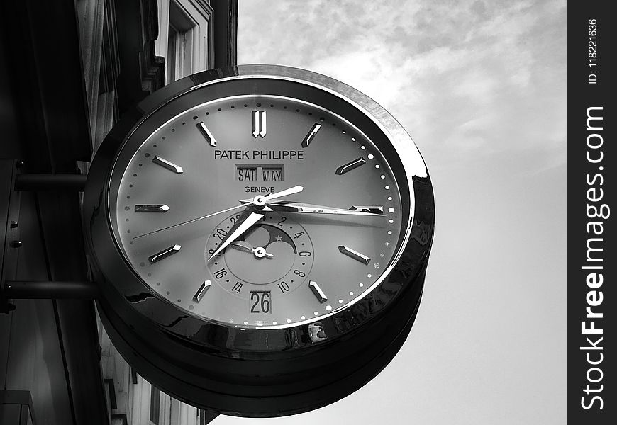 Gray Patek Philippe Clock Displaying 7:16