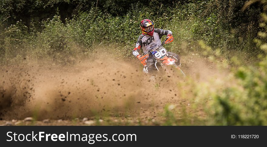 Person Riding Motocross Dirt Bike