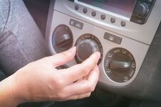 Driver Using Car Air-conditioning System Royalty Free Stock Photos