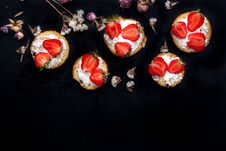 Fluffy Buttermilk Biscuits Shortcake With Red Ripe Strawberries And Fresh Whipped Cream On A Black Background Royalty Free Stock Photography