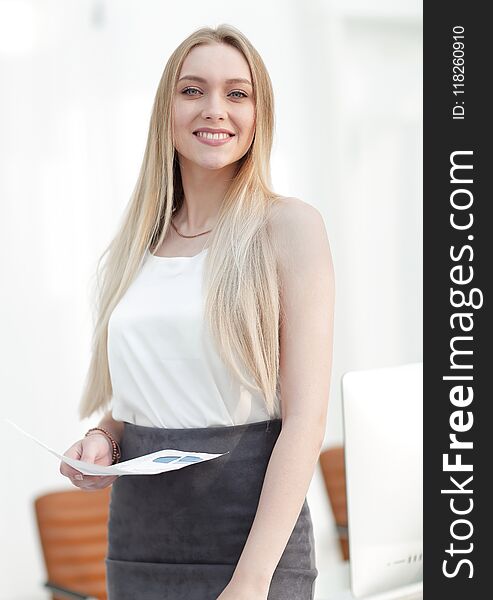 Close-up portrait of an elegant young business woman. Photo has a blank space for text