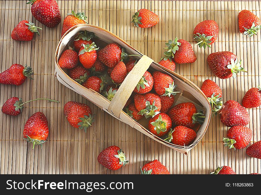 Strawberries In A Basket On A Table Top View