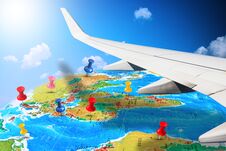 Flying Around The World With Aircraft Wing Overshadowing The Earth Map With Pins Marking Future Destinations Royalty Free Stock Images Flying Around The World With Aircraft Wing Overshadowing The Earth Map With Pins Marking Future Destinations Royalty Free Stock Images